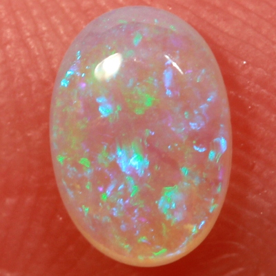 SOLID CRYSTAL OPAL Bright green fire in a 3 dimensional pattern